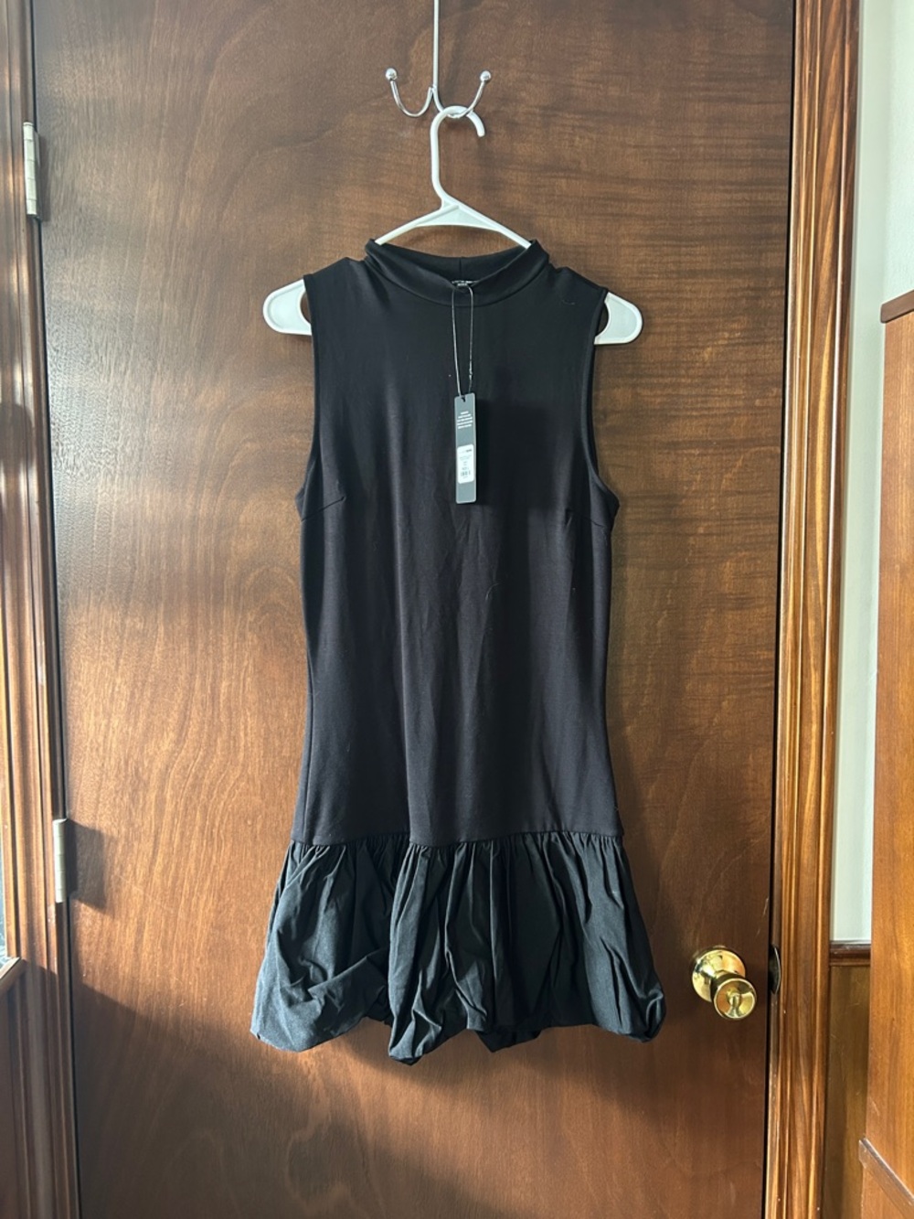 Fashion Nova Black Sleeveless Ruffle-Hem Mini Dress